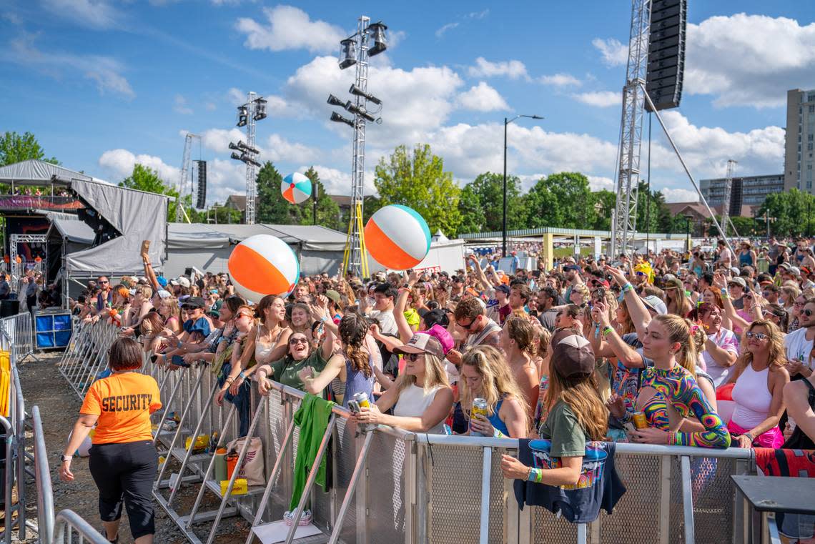 Fans at Lovin’ Life Music Fest bounce around beach balls between sets. Alex Cason/CharlotteFive