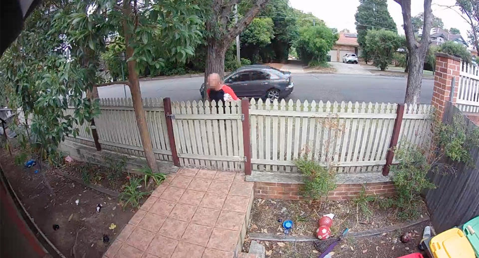 CCTV shows the man inspecting the front yard of the Northmead home. Source: Jrisí Jusakos / Supplied