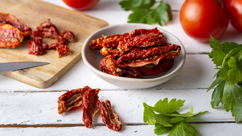 dish of sun-dried tomatoes with parsley alongside