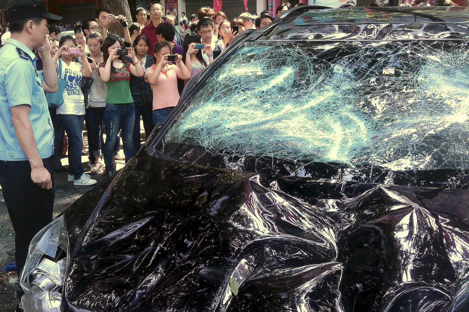 A Japanese-made car that was smashed in Xi’an, China, in 2012, amid protests over a territorial dispute between Beijing and Tokyo. (  / AP file)