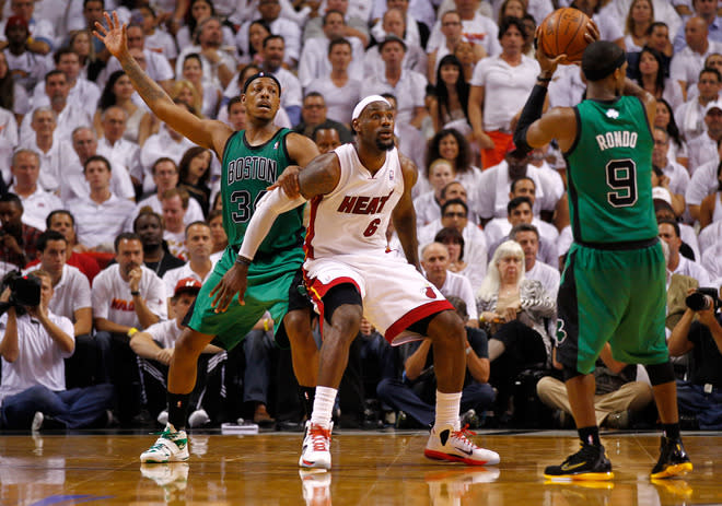 MIAMI, FL - MAY 30: Rajon Rondo #9 of the Boston Celtics looks to pass the ball as Paul Pierce #34 calls for the ball in the second half as he is defended by LeBron James #6 of the Miami Heat in Game Two of the Eastern Conference Finals in the 2012 NBA Playoffs on May 30, 2012 at American Airlines Arena in Miami, Florida. NOTE TO USER: User expressly acknowledges and agrees that, by downloading and or using this photograph, User is consenting to the terms and conditions of the Getty Images License Agreement. (Photo by Mike Ehrmann/Getty Images)