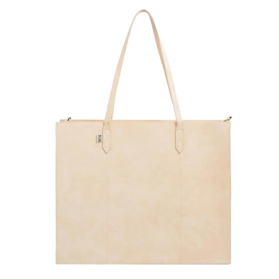 <p><a href="https://go.redirectingat.com?id=74968X1596630&url=https%3A%2F%2Fbeistravel.com%2Fproducts%2Fthe-work-tote-in-beige&sref=https%3A%2F%2Fwww.elledecor.com%2Fshopping%2Fhome-accessories%2Fg60768019%2Fbest-travel-tote-bags%2F" rel="nofollow noopener" target="_blank" data-ylk="slk:Shop Now;elm:context_link;itc:0;sec:content-canvas" class="link ">Shop Now</a></p><p>The Work Tote</p><p>beistravel.com</p><p>$128.00</p><span class="copyright">BÉIS</span>