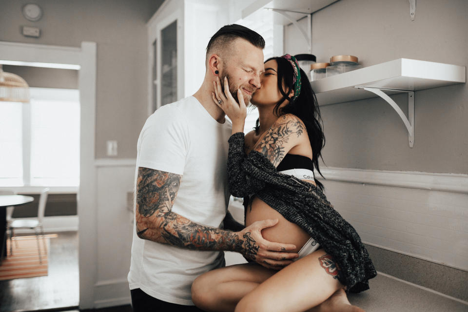 "Neither of us knew what to expect going into it since we&rsquo;ve never done anything like it before, but our photographer made us feel super comfortable. It was so much fun and we had a lot of laughs, but more than anything it was intimate. I felt beautiful and loved getting to embrace my growing belly with the love of my life. Just raw moments captured, and I will always remember exactly how we felt in that moment." &mdash; <i>Ngoc S.</i>