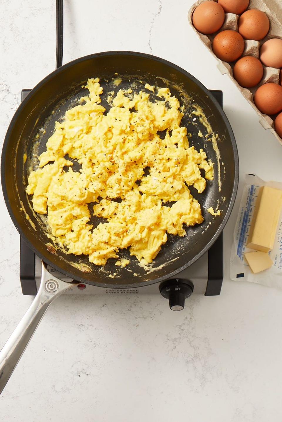 <p>There's nothing fancy or complicated about these scrambled eggs: they're just cooked over a lower heat to keep them from drying out, leaving you with glossy, tender eggs every time.<br></p><p>Get the <a href="https://www.goodhousekeeping.com/food-recipes/easy/a35092147/how-to-make-scrambled-eggs-recipe/" rel="nofollow noopener" target="_blank" data-ylk="slk:Easiest Scrambled Eggs recipe;elm:context_link;itc:0;sec:content-canvas" class="link "><strong>Easiest Scrambled Eggs recipe</strong></a><em>.</em></p>