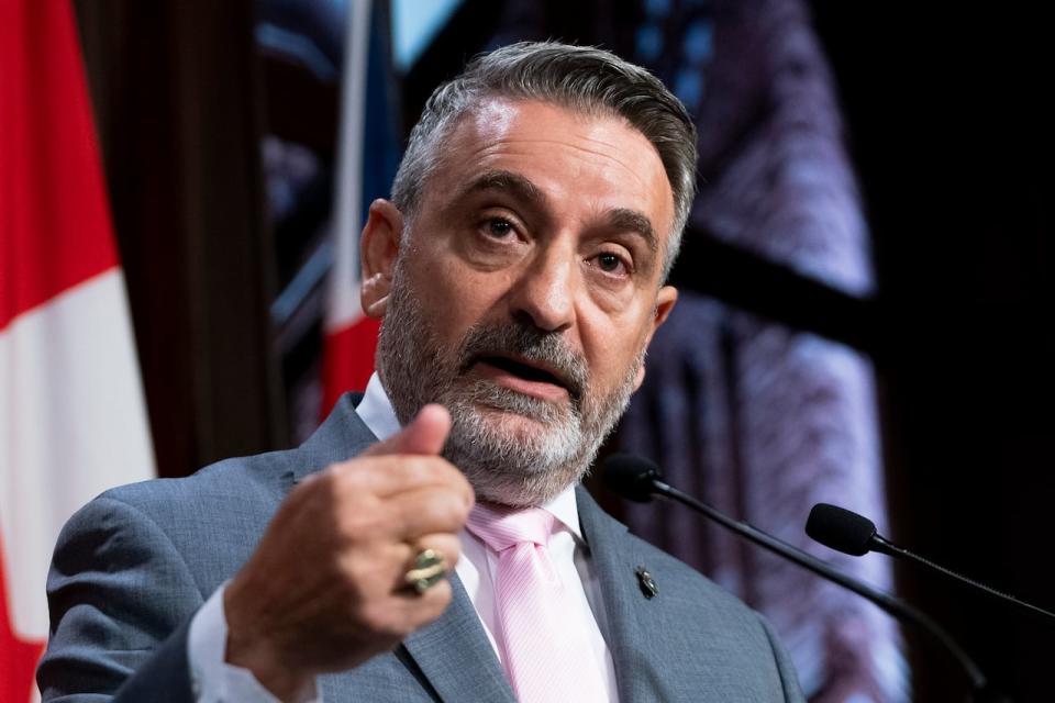 Minister of Municipal Affairs and Housing and Government House Leader Paul Calandra speaks to reporters in Toronto, on Sept. 7, 2023.
