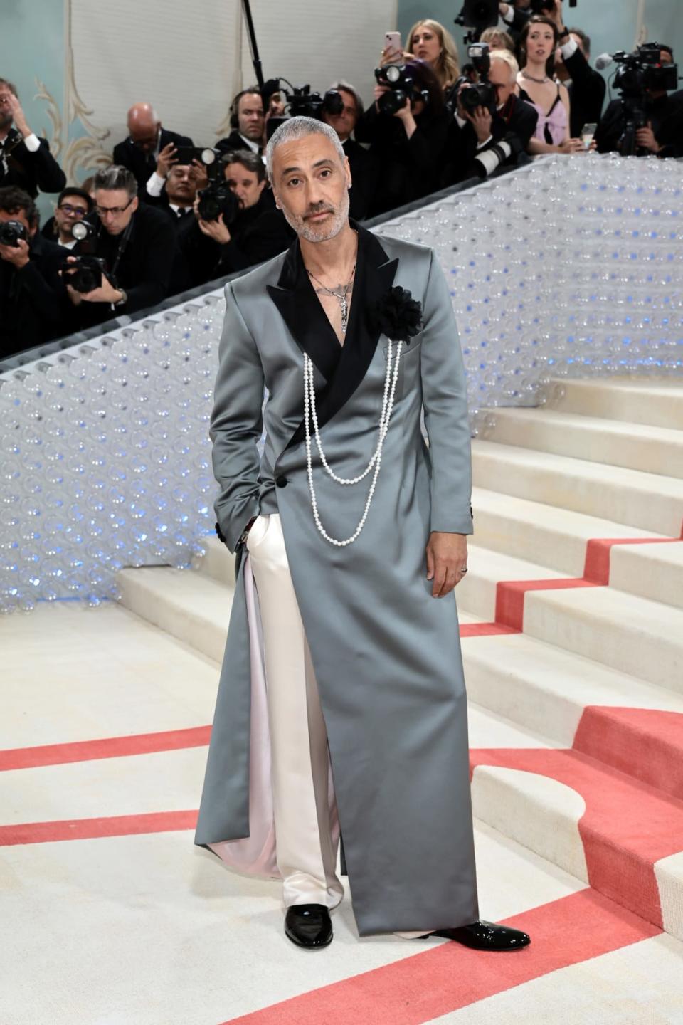 <div class="inline-image__caption"><p>Taika Waititi in Atelier Prabal Gurung.</p></div> <div class="inline-image__credit">Jamie McCarthy/Getty</div>