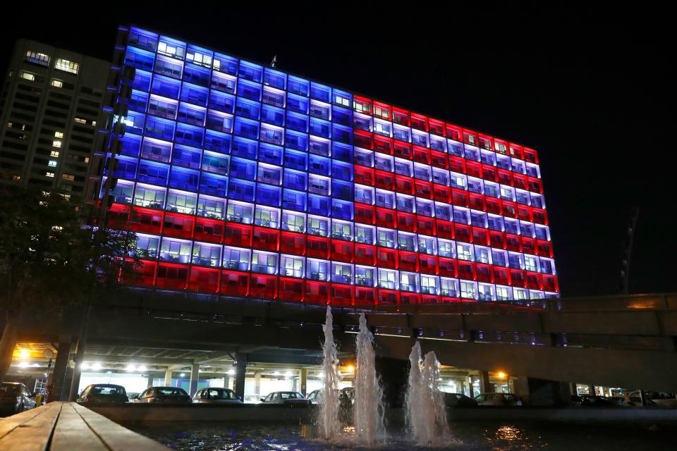 On Oct. 2, 2017, Tel Aviv city hall is lit up like the American flag to honor the victims of a mass shooting in Las Vegas.