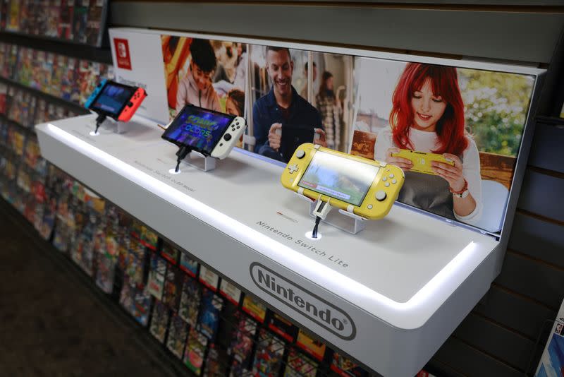 FILE PHOTO: Different models of the Nintendo Switch are seen on display in a GameStop in Manhattan, New York