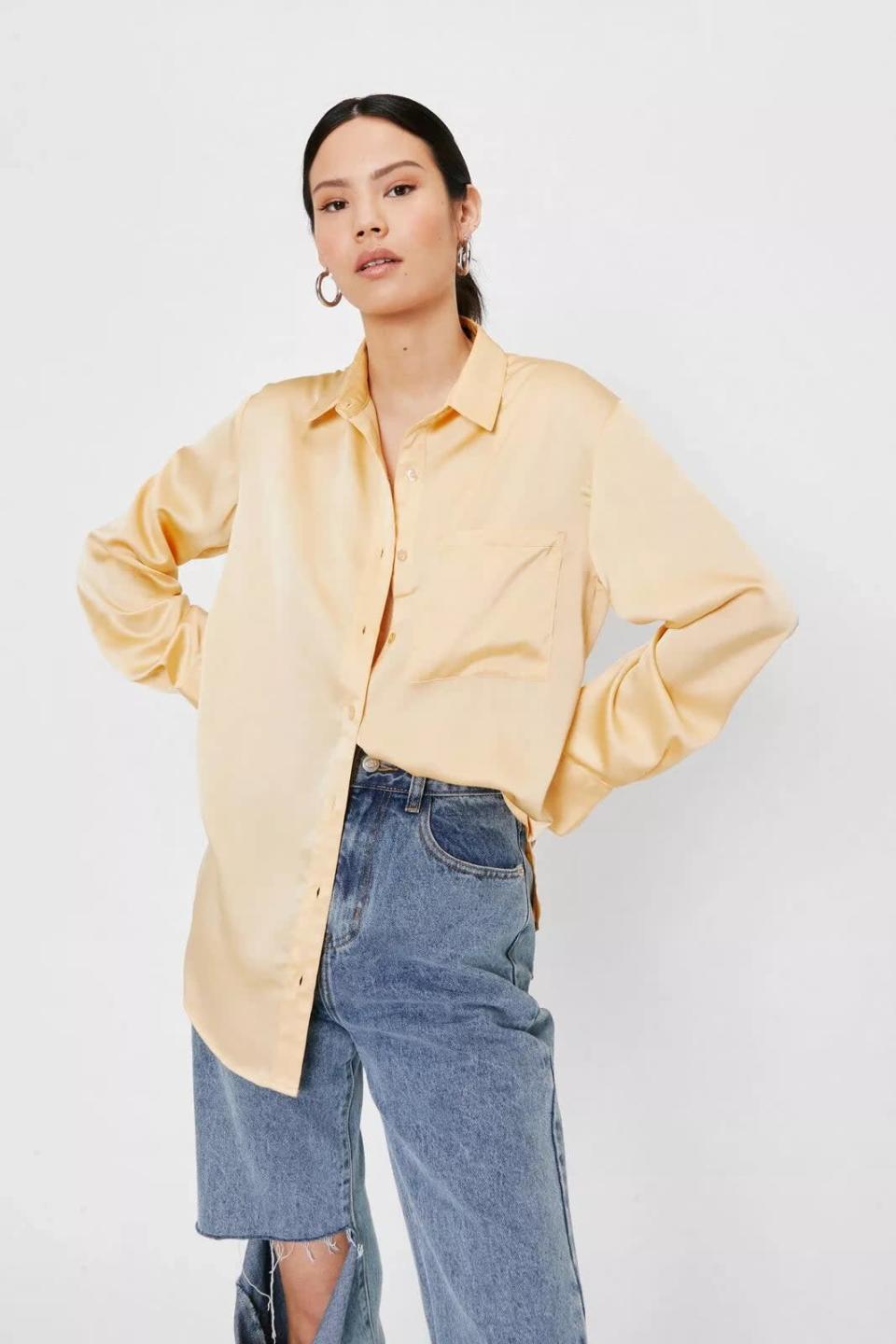 <p>From the lustrous fabric to the relaxed silhouette, there's something undeniably chic about this <span>Nasty Gal Satin Oversized Long Sleeve Pocket Shirt</span> ($12, originally $60). We love it paired with boyfriend jeans, but it will look just as good with a slinky slip skirt.</p>