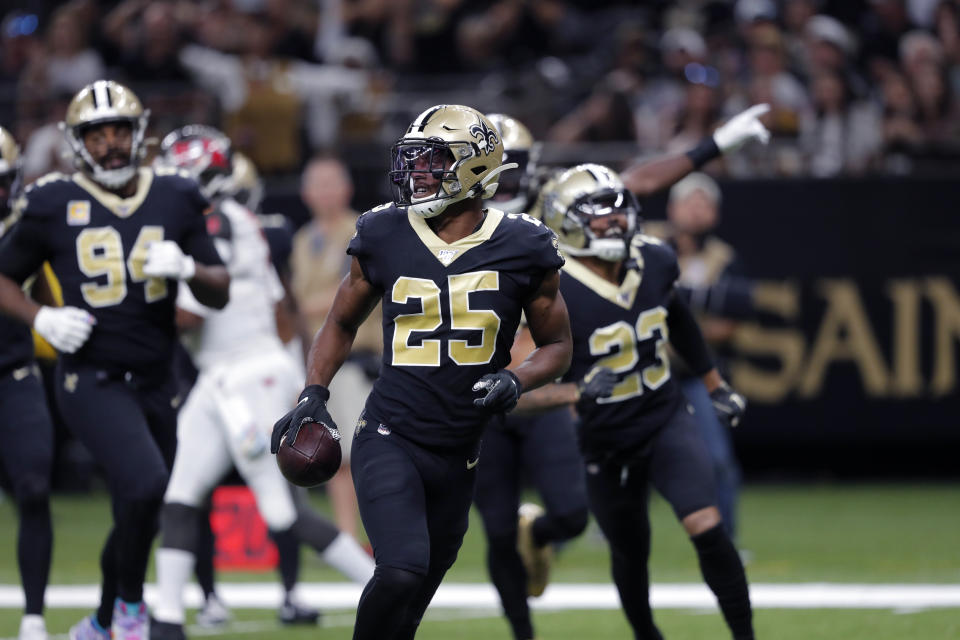 New Orleans Saints cornerback Eli Apple (25) holds the football after an interception that was called back in the second half of an NFL football game against the Tampa Bay Buccaneers in New Orleans, Sunday, Oct. 6, 2019. (AP Photo/Bill Feig)