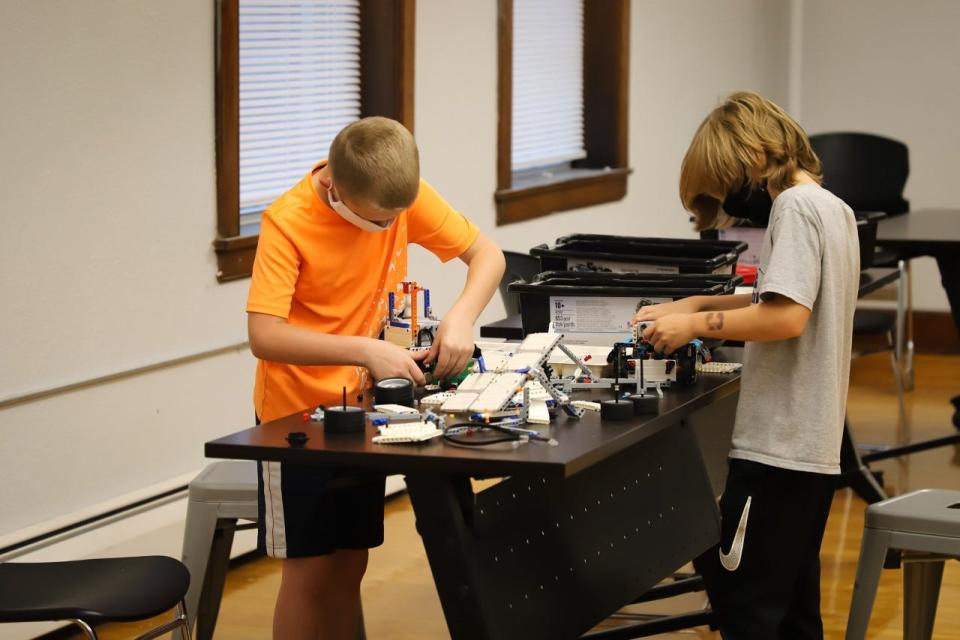 Kids work on a project at INNOVATE Albion, a tech education nonprofit launched by Caster Concepts in 2019.