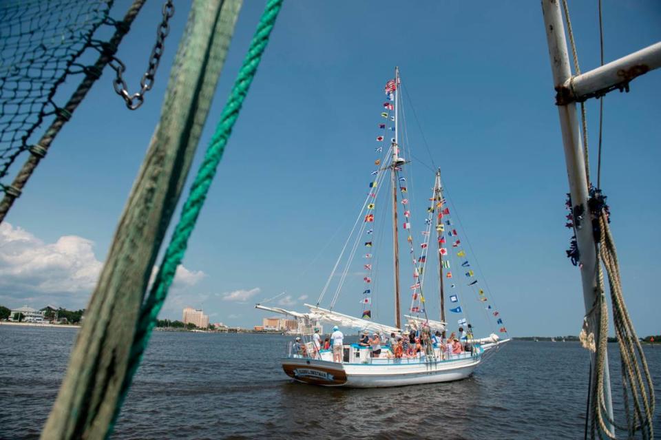 A boat decorated with flags during the Blessing of the Fleet in Biloxi on Sunday, May 28, 2023.
