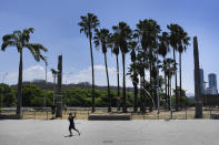 A child flies a kite at Plaza Venezuela in Caracas, Venezuela, Sunday, April 26, 2020. Venezuela’s government allowed for children to go outside and play for eight hours, after it had imposed quarantine to help stop the spread of the new coronavirus. (AP Photo/Matias Delacroix)