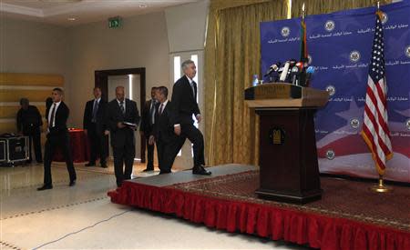 U.S. Deputy Secretary of State William Burns (R) arrives for a news conference in Tripoli April 24, 2014. REUTERS/Ismail Zitouny