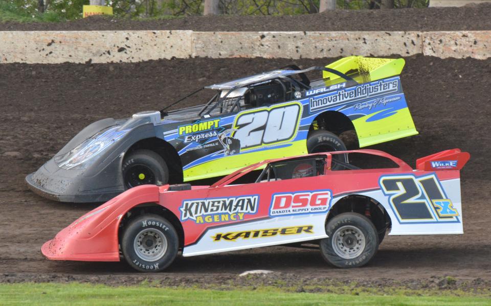 Limited late model drivers John Kaiser of Lake Norden (21X) and Doug Walsh of Watertown (20) head to the finish line during a 2022 racing program at Casino Speedway.