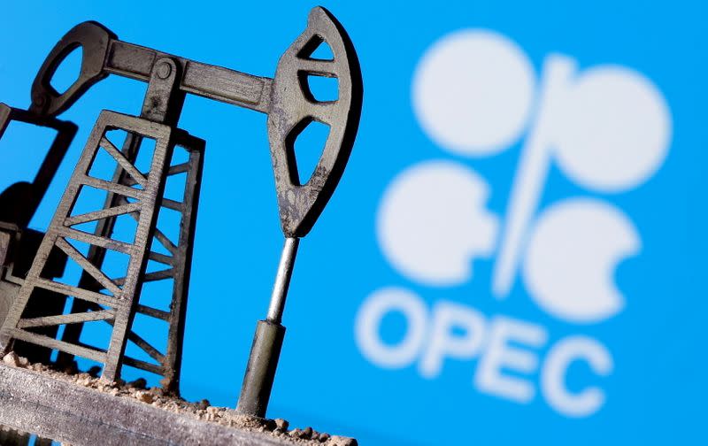 FILE PHOTO: A 3D-printed oil pump jack is seen in front of a displayed OPEC logo in this illustration picture