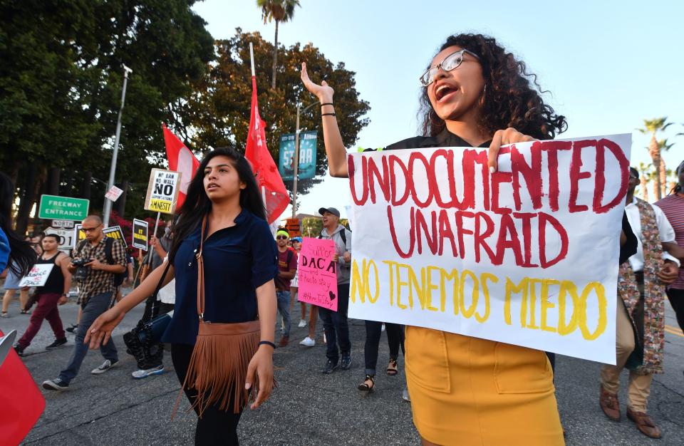 Young immigrants, activists and supporters of the DACA program march through downtown Los Angeles on&nbsp;Tuesday. (Photo: FREDERIC J. BROWN via Getty Images)