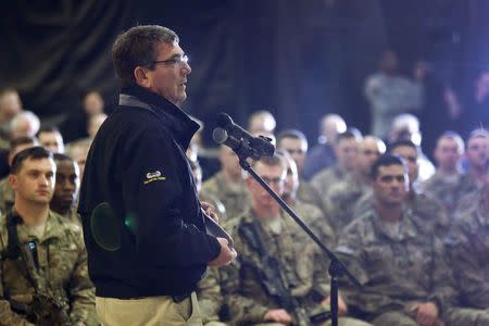 U.S. Secretary of Defense Ash Carter delivers remarks at a question-and-answer session with U.S. military personnel at Kandahar Airfield in Kandahar February 22, 2015. REUTERS/Jonathan Ernst