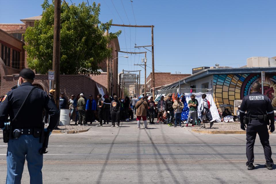 El Paso Police patrol El Paso streets where migrants are staying in front of Sacred Heart Church, on Saturday, April 29, 2023.