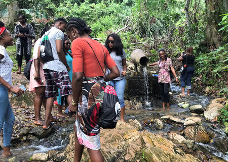 Tourist are seen walking through the warm spring at Ikogosi Warm Springs resort in Ekiti, Ekiti State, Nigeria November 11, 2018. Picture taken November 11, 2018. REUTERS/Seun Sanni