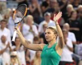 Aug 10, 2018; Montreal, Quebec, Canada; Simona Halep of Romania waves to the crowd after her win against Caroline Garcia of France (not pictured) during the Rogers Cup tennis tournament at Stade IGA. Mandatory Credit: Jean-Yves Ahern-USA TODAY Sports