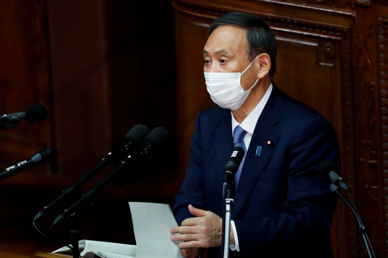 Japanese Prime Minister Yoshihide Suga gives his first policy speech in parliament in Tokyo