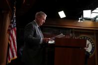 U.S. Senator Graham (R-SC) arrives for a press conference on Capitol Hill in Washington