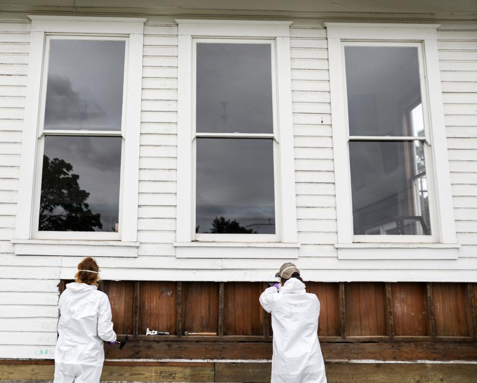 Students from the Historic Preservation and Restoration program at Clatsop Community College work to repair dry rot on the historical Criterion Schoolhouse at the Oregon State Fairgrounds on Tuesday, July 25, 2023 in Salem, Ore. 