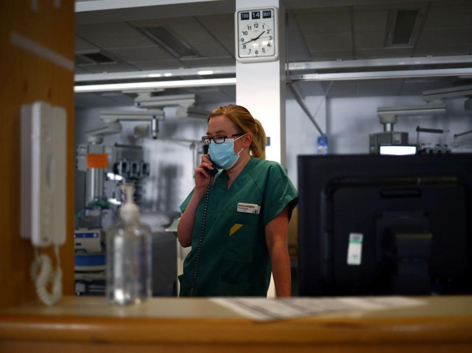 A number of hospitals have been forced to reintroduce the wearing of masks (POOL/AFP via Getty Images)