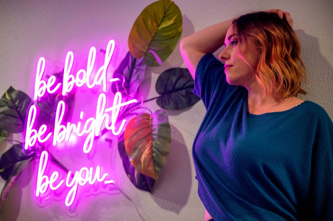 Jody Akerman poses for a portrait inside her studio in downtown Puyallup on Thursday, Oct. 20, 2022. Akerman is a boudoir photographer and owns Bright Eyes Photography.