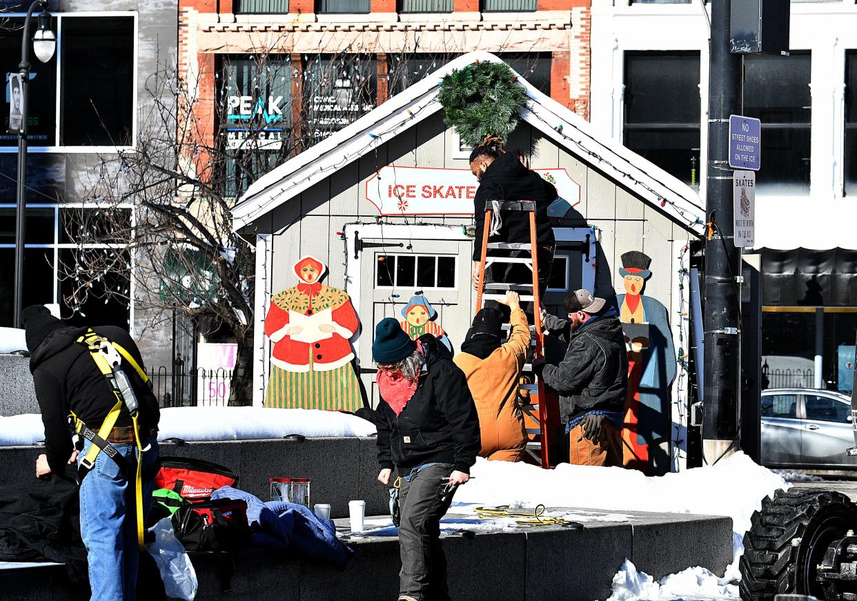 New Christmas decorations go up in downtown Worcester during the February 2022 filming of "The Holdovers."