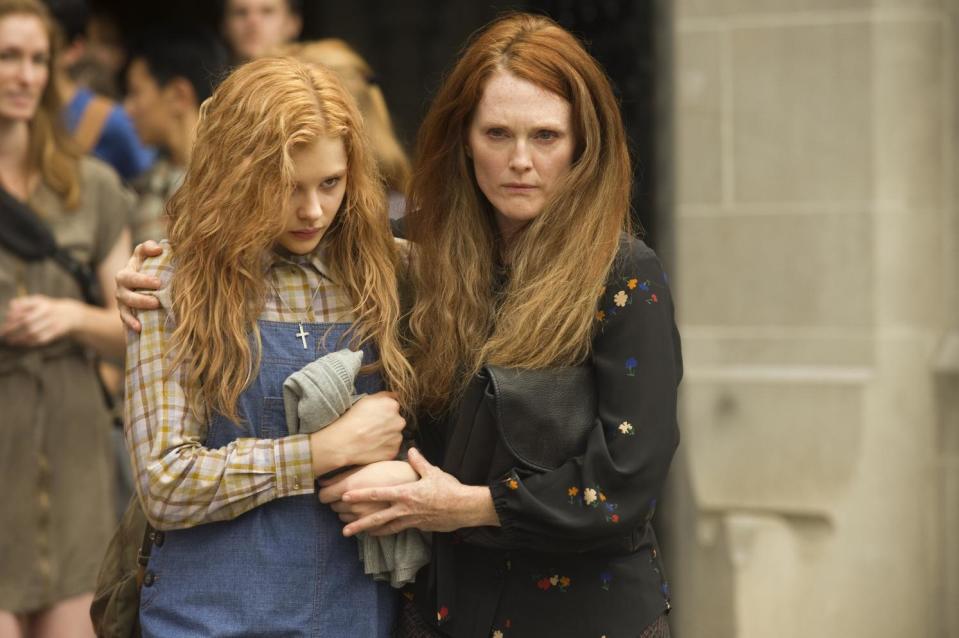 This photo released by Sony Pictures shows Chloe Moretz, left, and Julianne Moore in Metro-Goldwyn-Mayer Pictures and Screen Gems' film, "Carrie." (AP Photo/Copyright Metro-Goldwyn-Mayer Pictures Inc. and Screen Gems, Inc., Michael Gibson)