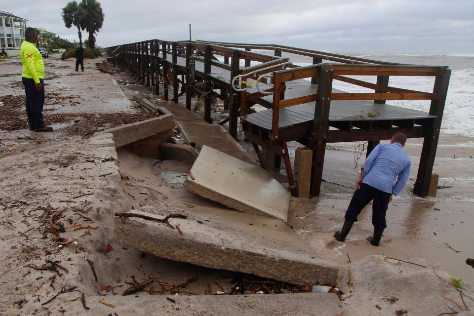 Portions of the Conn Beach boardwalk have broken from the foundation of Ocean Drive due to shoreline erosion in Vero Beach after Hurricane Nicole made landfall on Thursday Nov. 10, 2022.