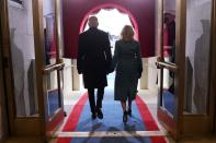 <p>Joe and Jill Biden prepare to walk the Capitol steps on Wednesday.</p>