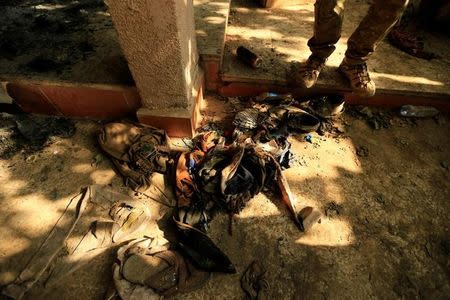 Clothes of prisoners who were detained by Islamic State militants are seen in Hammam al-Ali, south of Mosul, during an operation to attack Islamic State militants in Mosul, Iraq November 7, 2016. REUTERS/Thaier Al-Sudani