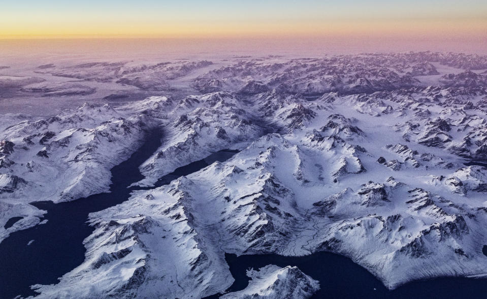 An aerial shot of mountains in Greenland