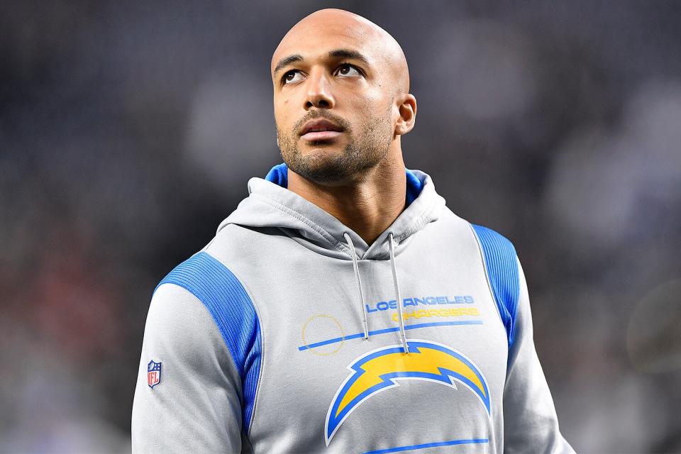 Running back Austin Ekeler #30 of the Los Angeles Chargers looks on before a game against the Las Vegas Raidersat Allegiant Stadium on January 09, 2022 in Las Vegas, Nevada. The Raiders defeated the Chargers 35-32 in overtime.
