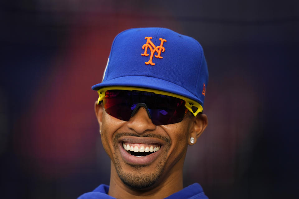 New York Mets Francisco Lindor smiles during a workout day at the London stadium in London, Friday, June 7, 2024. New York Mets will play games against Philadelphia Phillies at the stadium on June 8 and June 9. (AP Photo/Kirsty Wigglesworth)