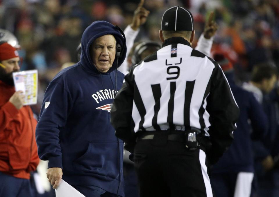 New England Patriots head coach Bill Belichick argues with line judge Mark Perlman (9) during the first half of the AFC championship NFL football game against the Pittsburgh Steelers, Sunday, Jan. 22, 2017, in Foxborough, Mass. (AP Photo/Elise Amendola)