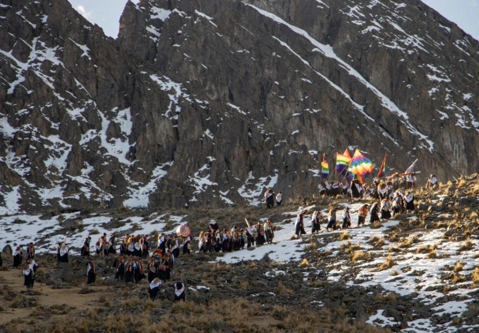 Devotees climb up the skirts of the Sinakara Mount.