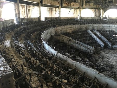 The charred interior of the parliament is seen after it was burned in post-election protests in Libreville, Gabon, September 20, 2016. REUTERS/Edward McAllister