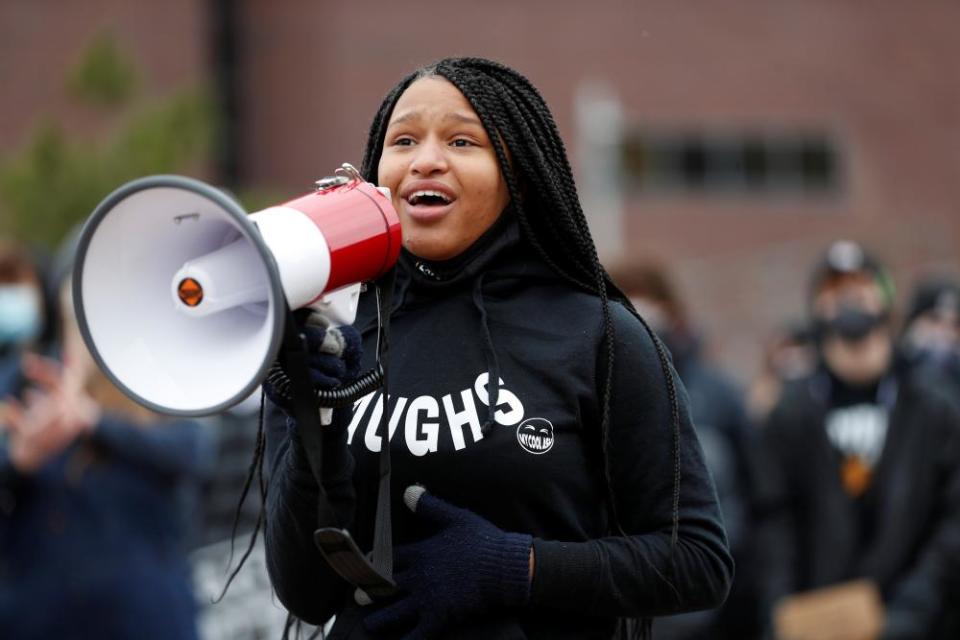 Mikel Henderson, 13, speaks during a demonstration in Minneapolis.