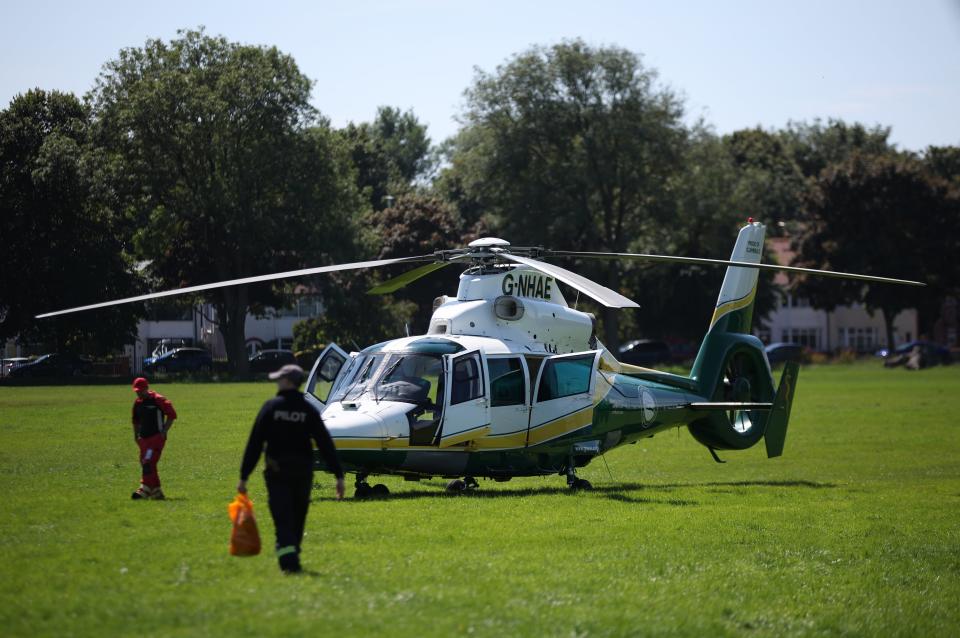 An air ambulance pictured close to the scene of the stabbings (EPA)