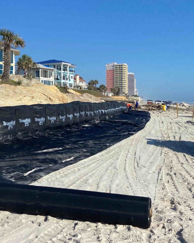 TrapBags, sand-filled geotextile containers, are replacing Tiger Dams along coastal properties that sustained erosion in Tropical Storms Ian and Nicole.