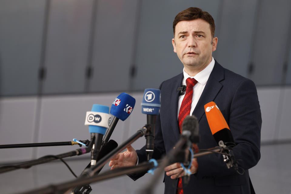 North Macedonia's Foreign Minister Bujar Osmani talks to journalists as he arrives to a meeting of NATO foreign ministers at NATO headquarters in Brussels, Tuesday, Nov. 28, 2023. NATO foreign ministers on Tuesday begin a two-day meeting in which the alliance will reaffirm its support for Ukraine's defense against Russia's invasion, explore ways of easing tensions between Kosovo and Serbia and look at preparations for NATO's 75th anniversary next year. (AP Photo/Geert Vanden Wijngaert)