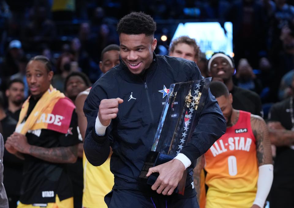 Team Giannis forward Giannis Antetokounmpo celebrates with the NBA All-Star Game Trophy after the 2023 NBA All-Star Game at Vivint Arena Salt Lake City, Utah, in 2023.