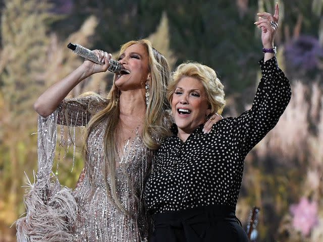 <p>VALERIE MACON/AFP/Getty </p> Jennifer Lopez performs onstage with her mother Guadalupe Rodriguez during the taping of the "Vax Live" fundraising concert on May 2, 2021 at SoFi Stadium.