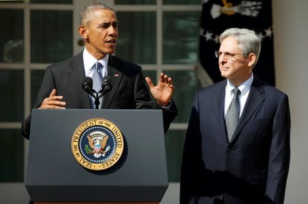 U.S. President Barack Obama annnounces Judge Merrick Garland (R) of the United States Court of Appeals as his nominee for the U.S. Supreme Court in the Rose Garden of the White House in Washington March 16, 2016. REUTERS/Kevin Lamarque