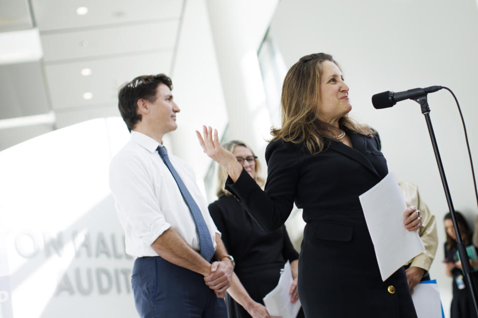 Deputy Prime Minister Chrystia Freeland speaks beside Prime Minister Justin Trudeau during an announcement at Women’s College Hospital, in Toronto, Thursday, March 7, 2024.  THE CANADIAN PRESS/Cole Burston