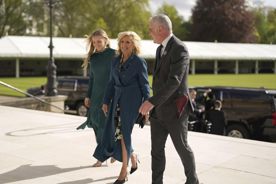 The First Lady of the United States, Jill Biden and her grand daughter Finnegan Biden, left, arrive at Buckingham Palace in London Friday May 5, 2023, for a reception hosted by Britain's King Charles III, for overseas guests attending his coronation. (Jacob King, Pool via AP)